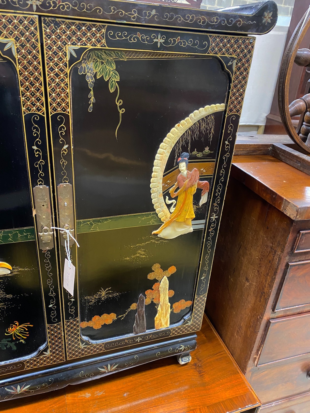 A Chinese black lacquer hardstone and composition mounted two door side cabinet, width 77cm, depth 41cm, height 90cm
